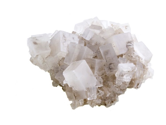 microscopic view of pinkish salt crystal